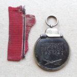 The Eastern Front Medal 1941/42 Kurland relic - Image 2